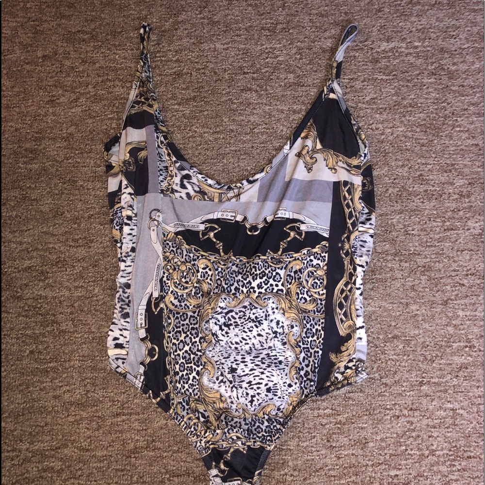 PLT brand new bodysuit